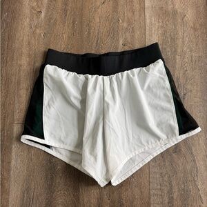 Varsity Shorts. White w/ green shorts. Women’s size small.Great used condition.